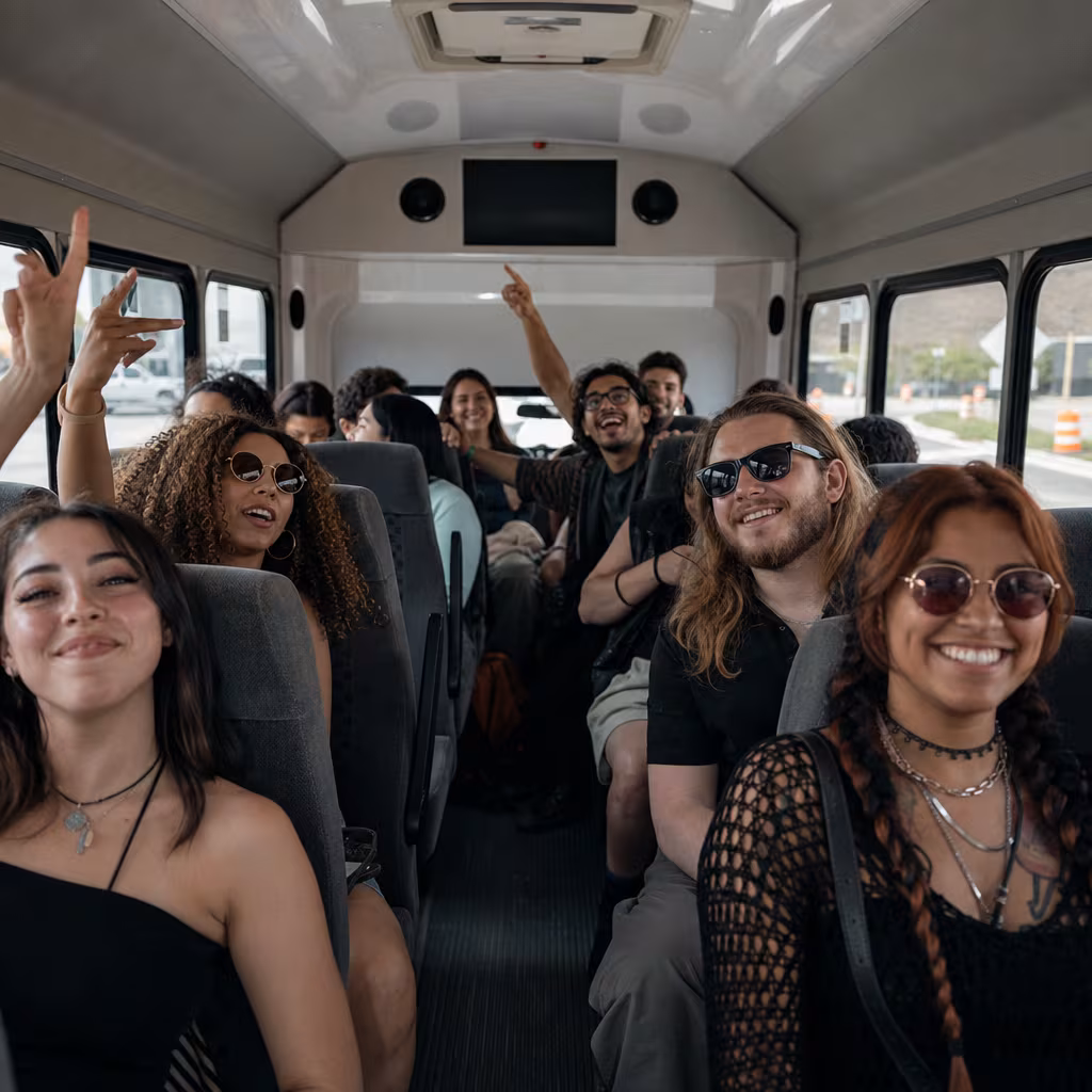 Party bus interior with wraparound leather seating and LED lighting in Dallas